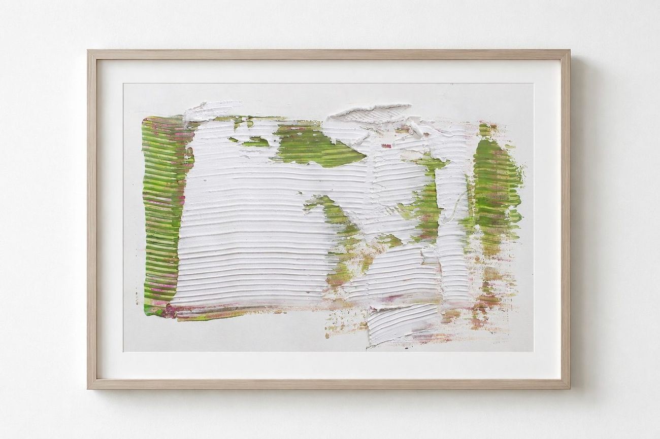 A thickly troweled white work with green edges, in a pale frame