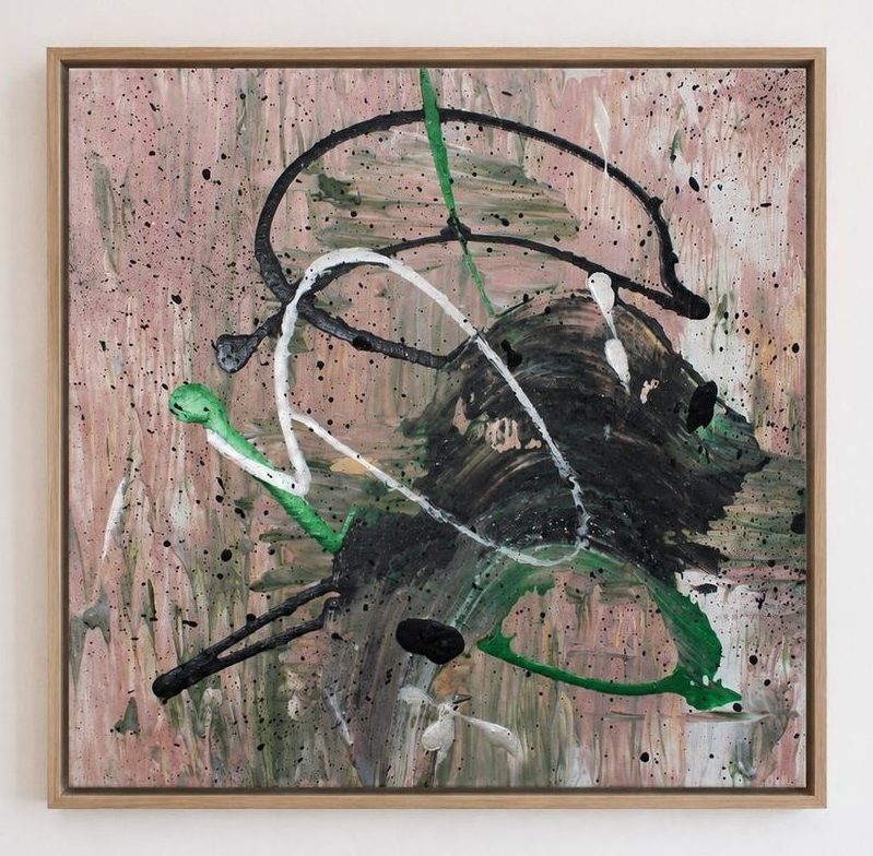 A pink and olive canvas with black, white and green loops, in an oak frame