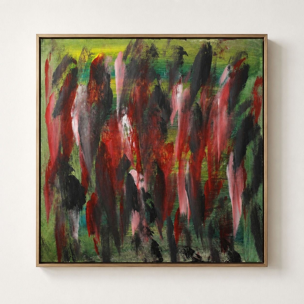 A green canvas with red, pink and black vertical strokes, in a pale frame