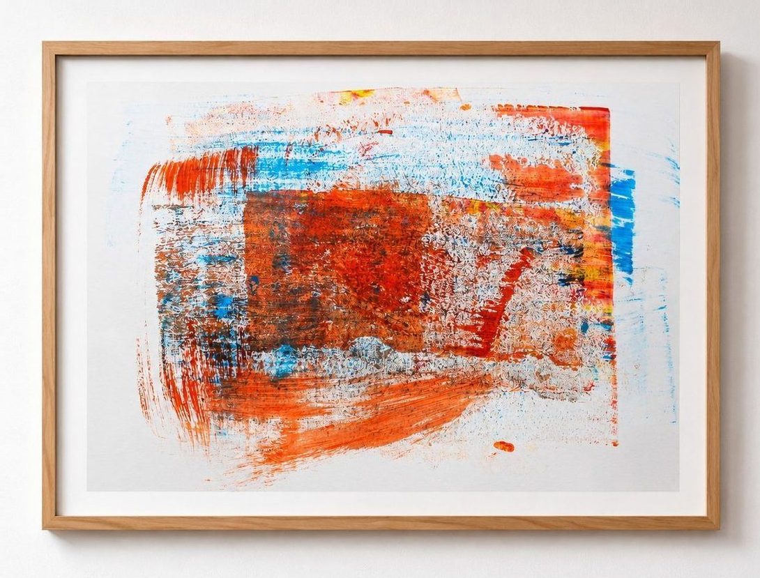 An orange and red work with blue edges, in an oak frame