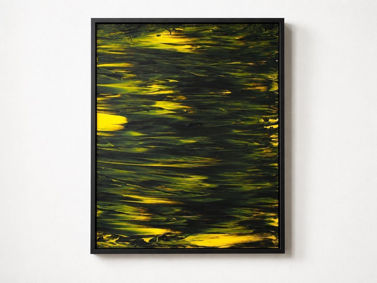 A dark green canvas streaked with yellow, in a black frame
