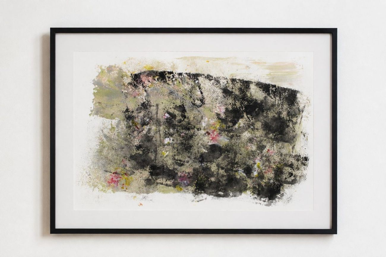 A black and olive mossy work with pink flecks, in a black frame