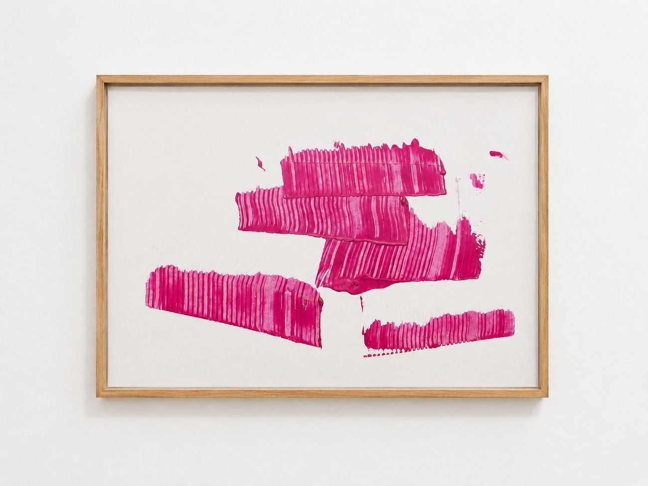 Pink combed bands on white paper, in an oak frame