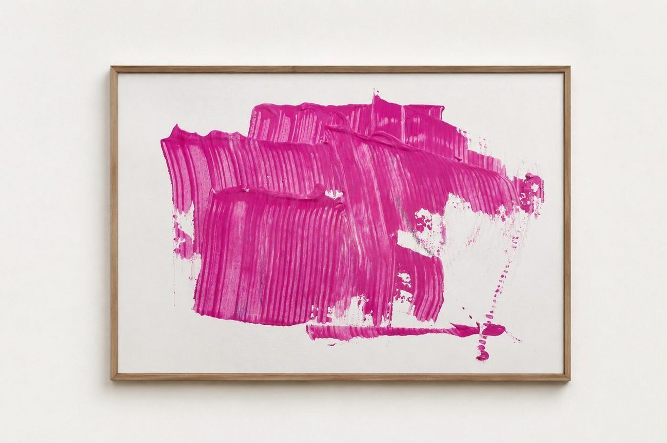 A magenta combed painting on paper, in an oak frame