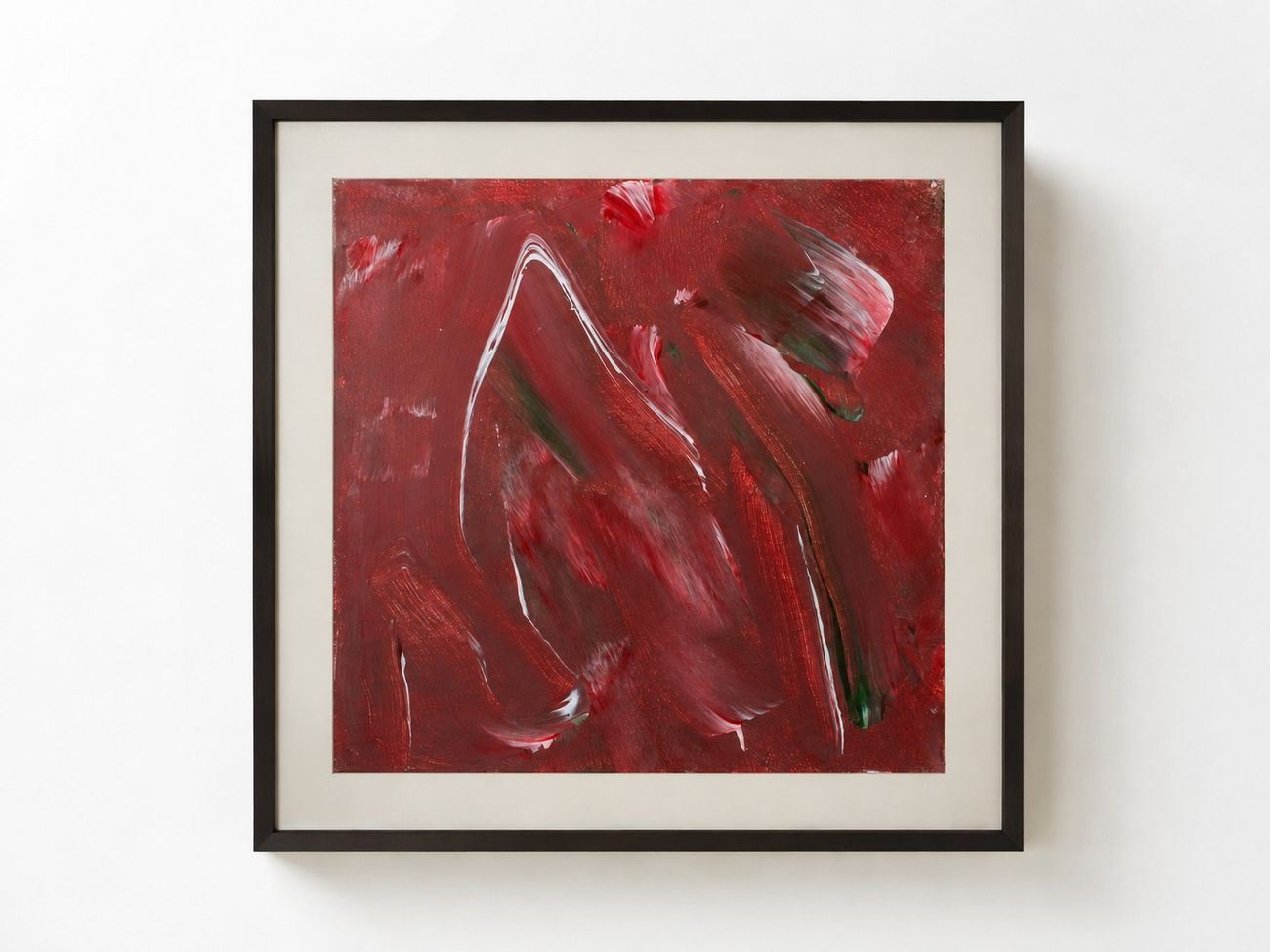 A deep red work with white and green strokes, in a black frame