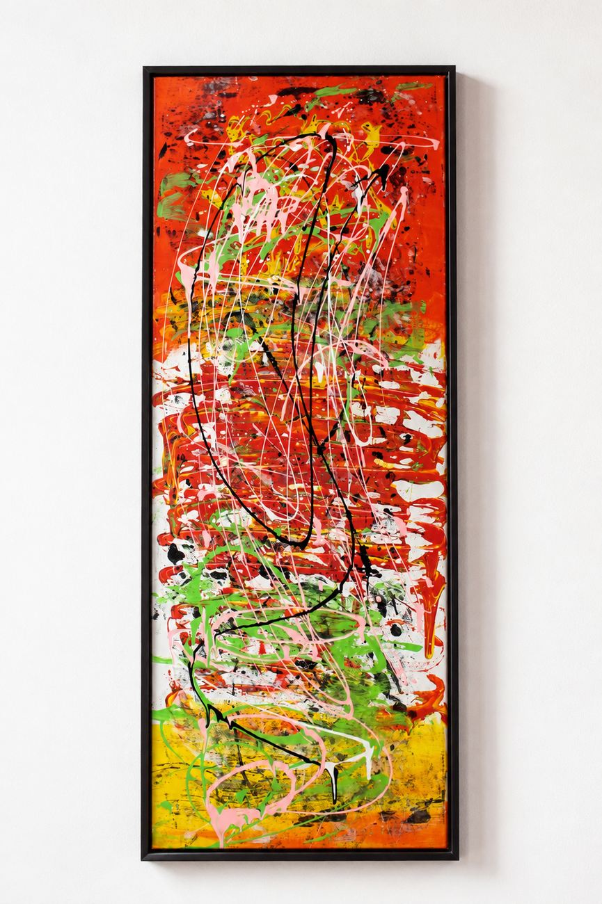 A tall canvas of red, green and yellow drips with black lines, in a black frame