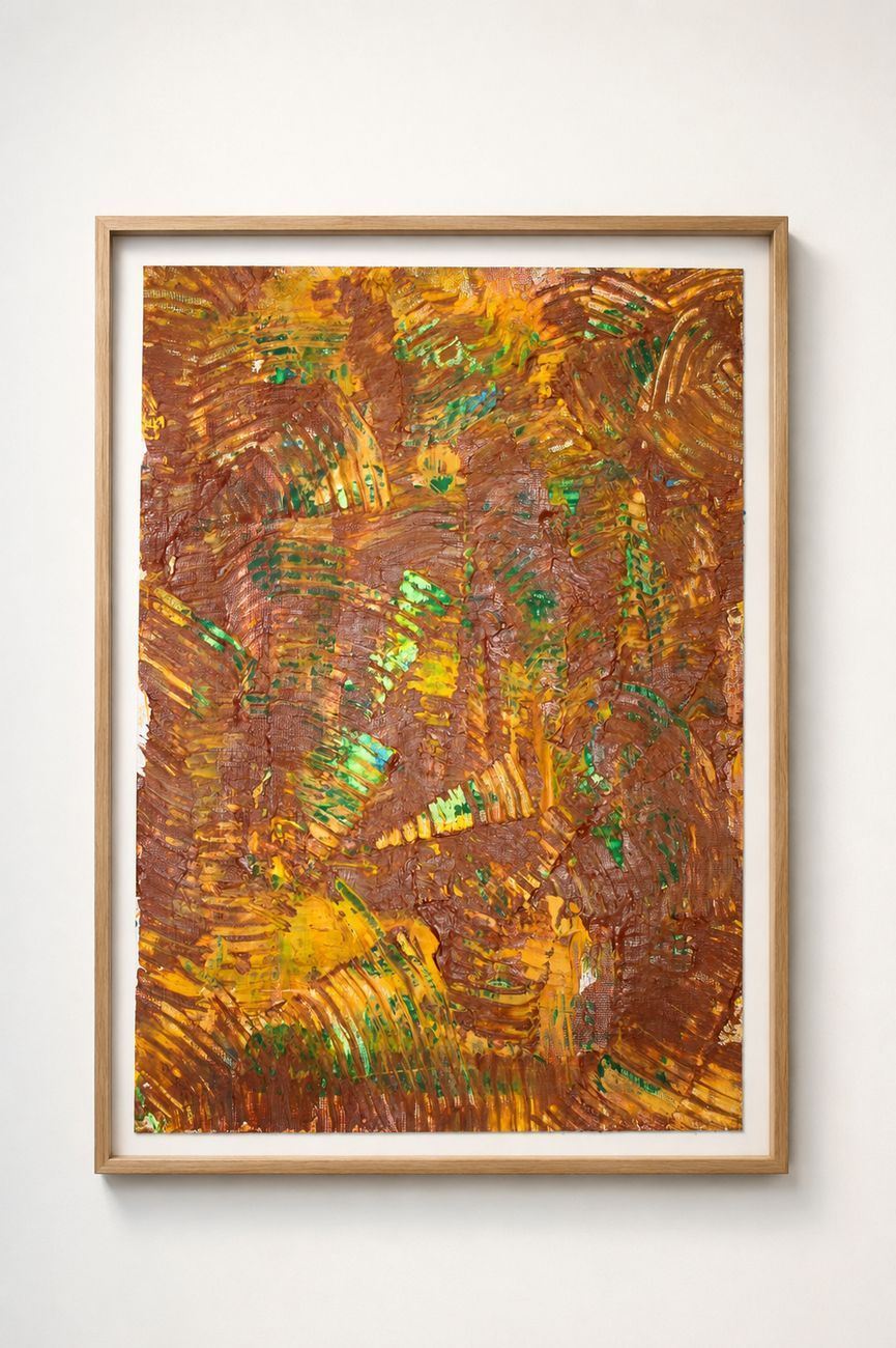 A brown and gold combed work with green showing through, in an oak frame
