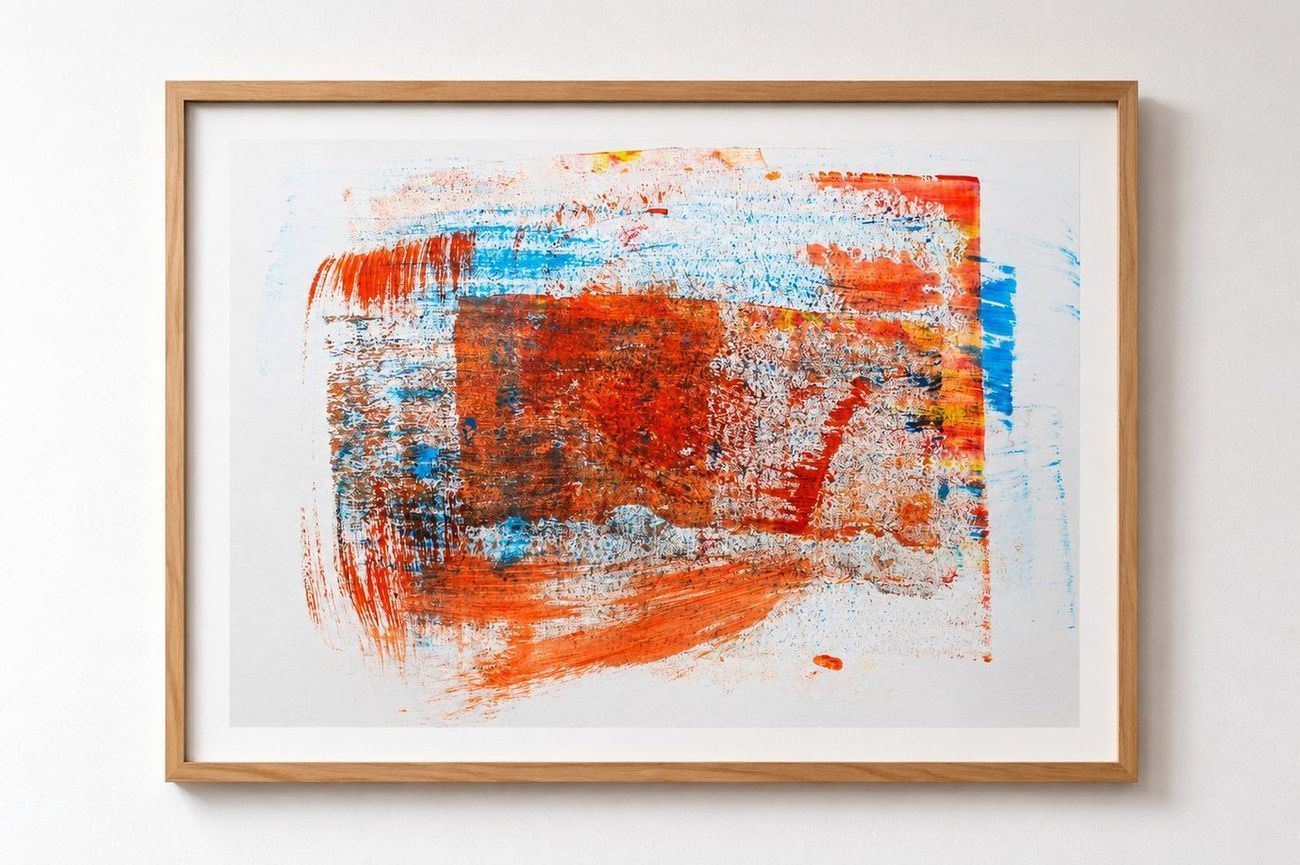 An orange and red work with blue edges, in an oak frame