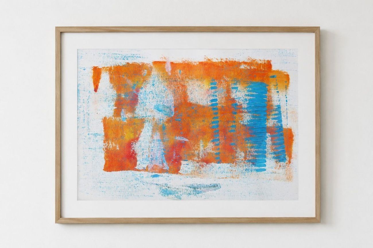 An orange and blue print with combed blue strokes, in an oak frame